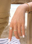 <em>RINGS</em>